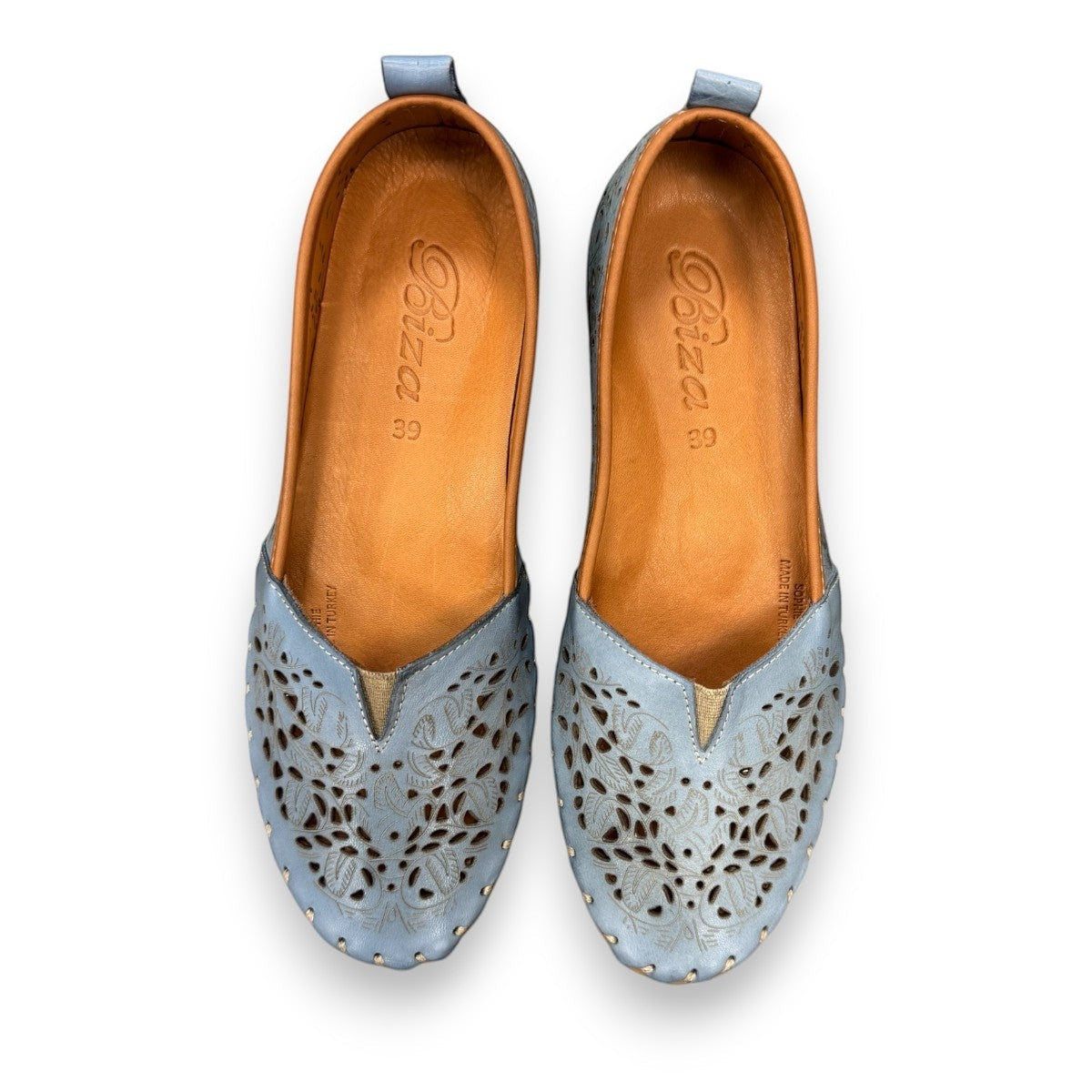Biza Sophie denim blue leather slip-on loafer with laser cut floral detailing and moccasin stitching