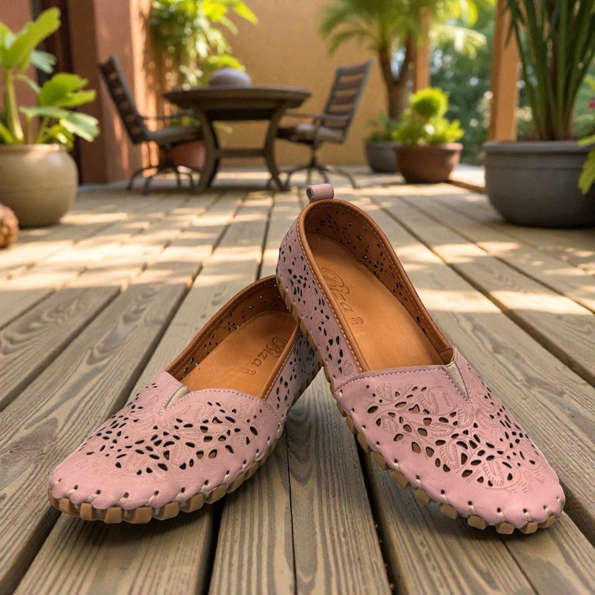 Biza Sophie rose pink leather slip-on loafer with laser cut floral detailing and handstitched sole