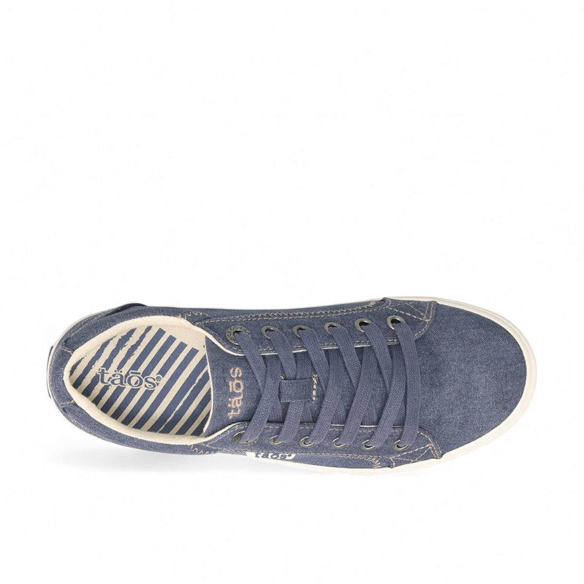 Taos Plim Soul blue wash canvas sneaker with thick rubber platform and decorative zigzag stitching. Photo of upper view.