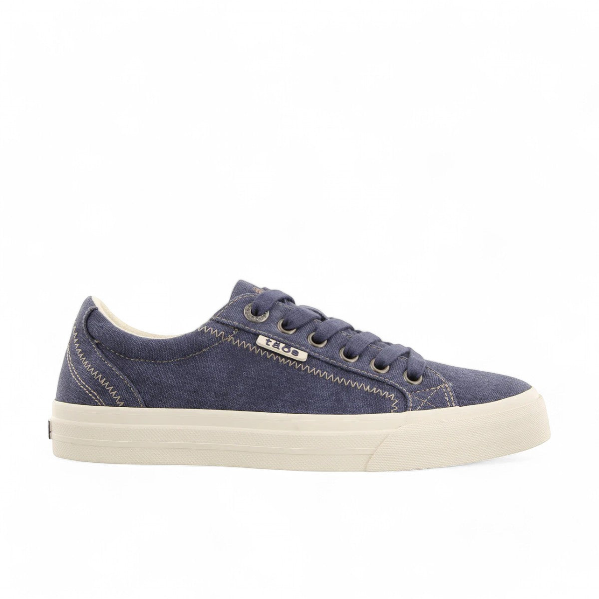 Taos Plim Soul blue wash canvas sneaker with thick rubber platform and decorative zigzag stitching. Photo of side view.