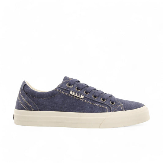 Taos Plim Soul blue wash canvas sneaker with thick rubber platform and decorative zigzag stitching. Photo of side view.