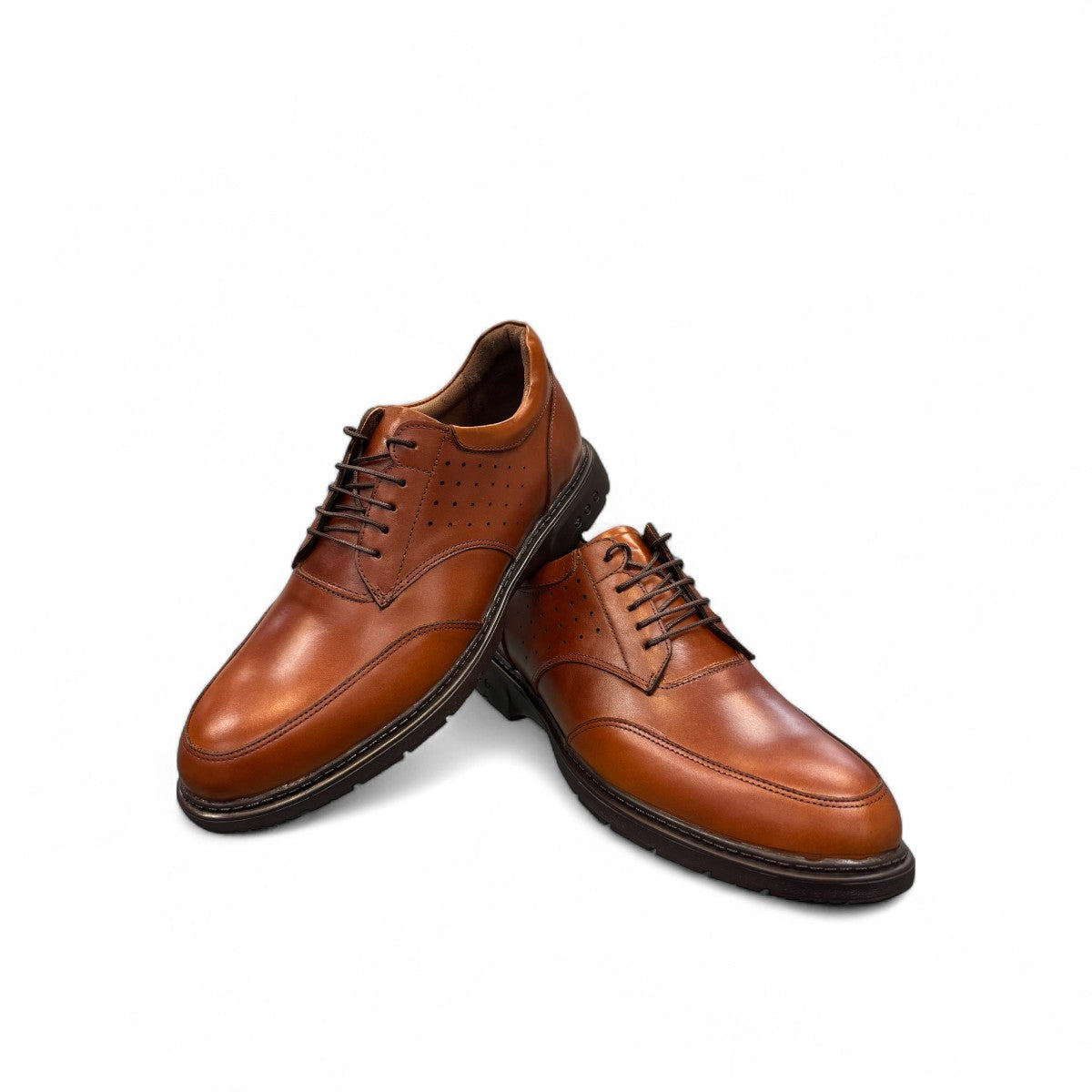BORNA BORNA brown leather men's dress shoes with perforated side detailing and a durable rubber outsole. Photo of front side view.