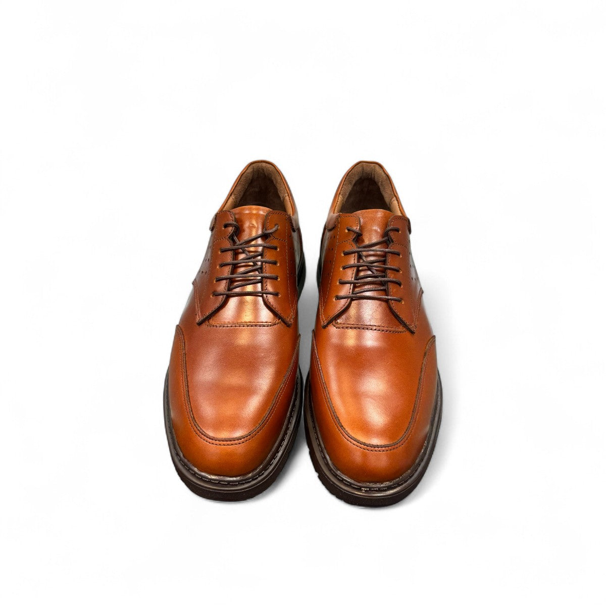 BORNA BORNA brown leather men's dress shoes with perforated side detailing and a durable rubber outsole. Photo of front view.