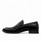 Borna Darakeh black leather loafers for men with a durable rubber outsole and sleek slip-on design. Photo of left side view.
