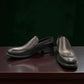 Borna Darakeh black leather loafers for men with a durable rubber outsole and sleek slip-on design. Photo of front side view.