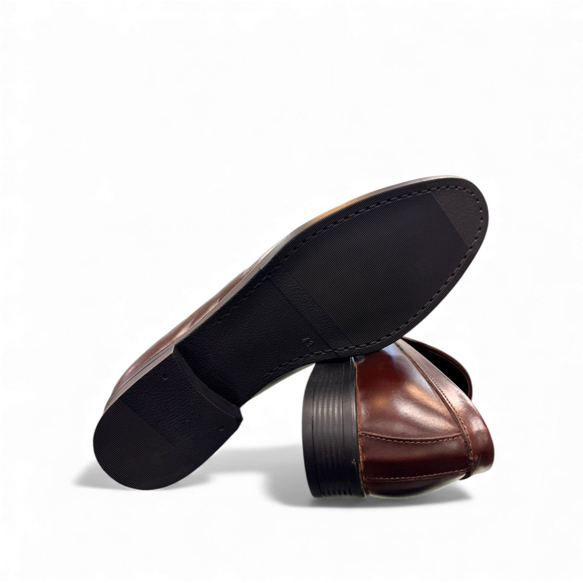 BORNA DARAKEH dark brown leather loafers for men with a durable rubber outsole and sleek slip-on design. Photo of bottom view.