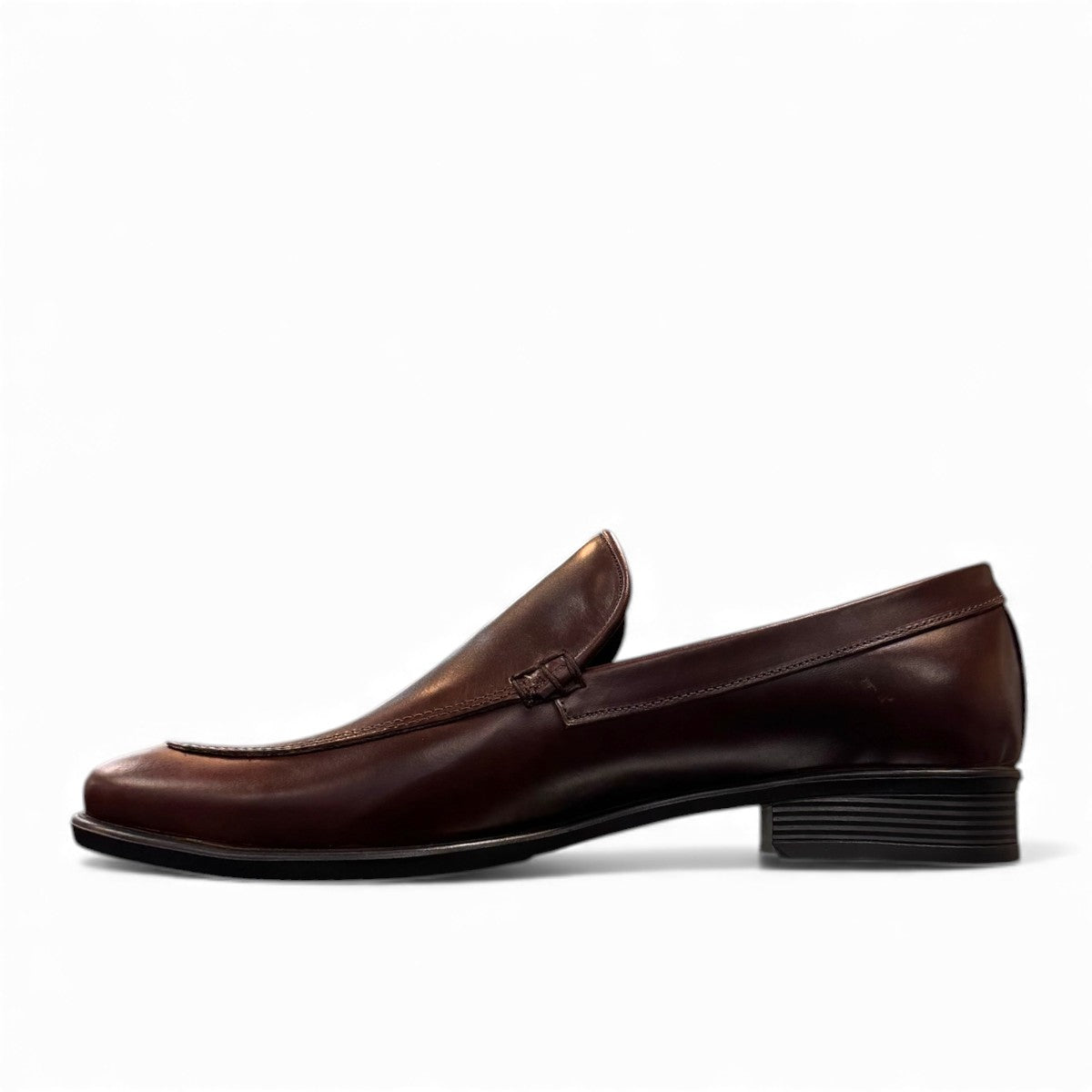 BORNA DARAKEH dark brown leather loafers for men with a durable rubber outsole and sleek slip-on design. Photo of left side view.