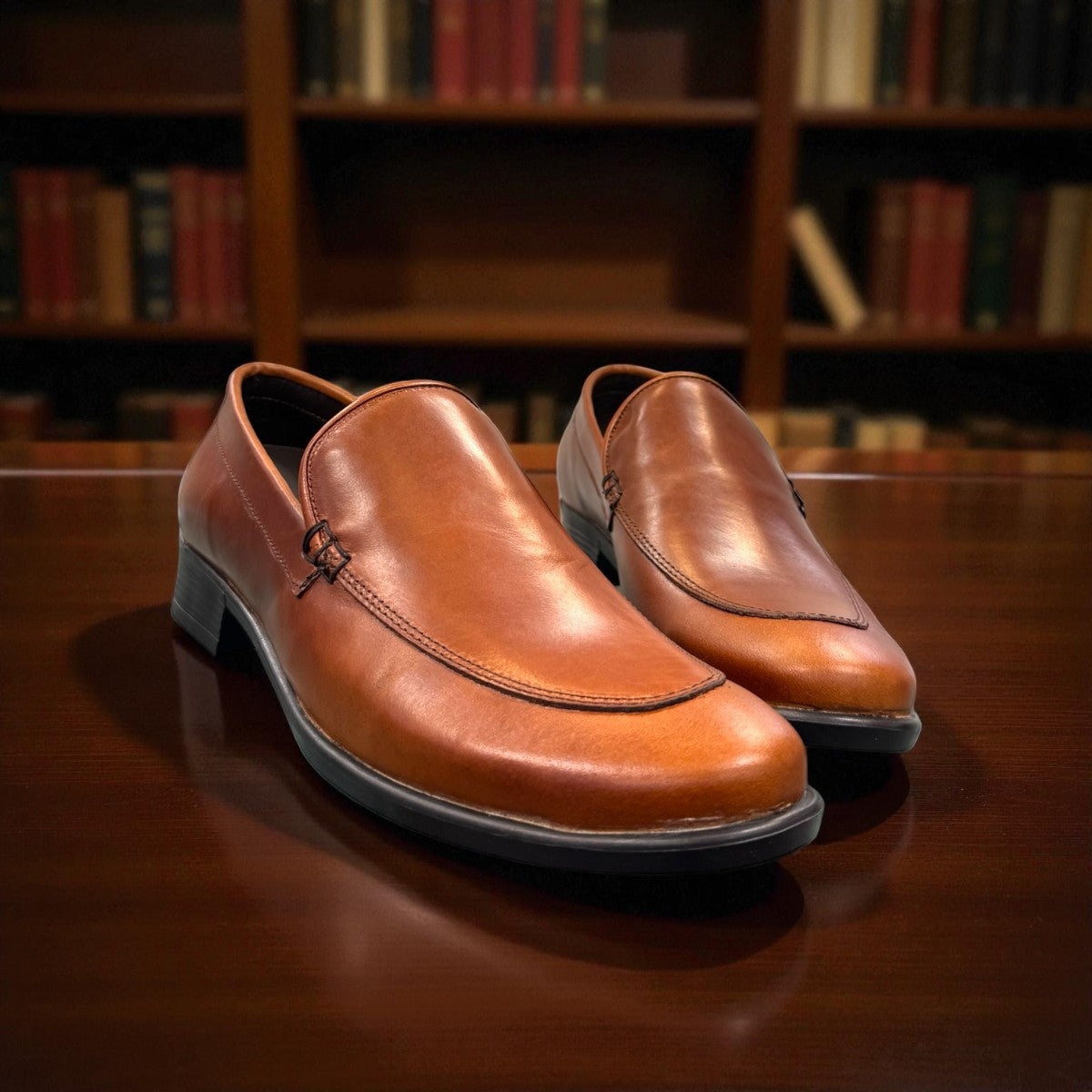 Borna Darakeh light brown leather loafers with a sleek profile and durable rubber outsole. Photo of front side view 2.