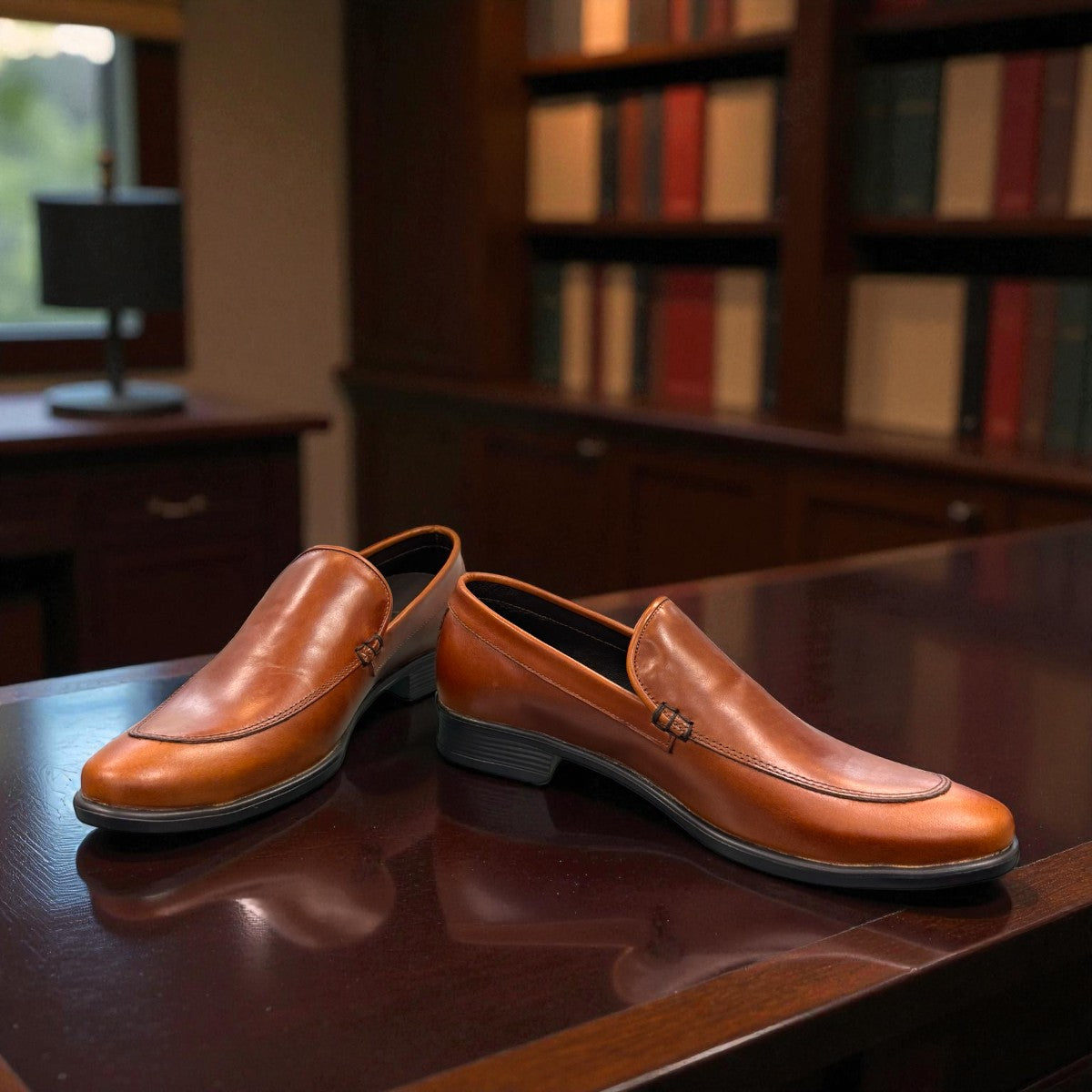 Borna Darakeh light brown leather loafers with a sleek profile and durable rubber outsole. Photo of front side view 1.