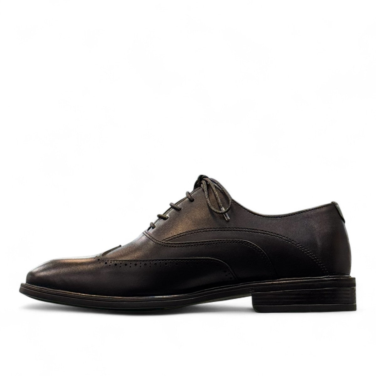 BORNA DRESSY black leather oxford shoes with brogue detailing and a durable rubber outsole. Photo of left side view,