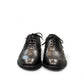BORNA DRESSY black leather oxford shoes with brogue detailing and a durable rubber outsole. Photo of front view.