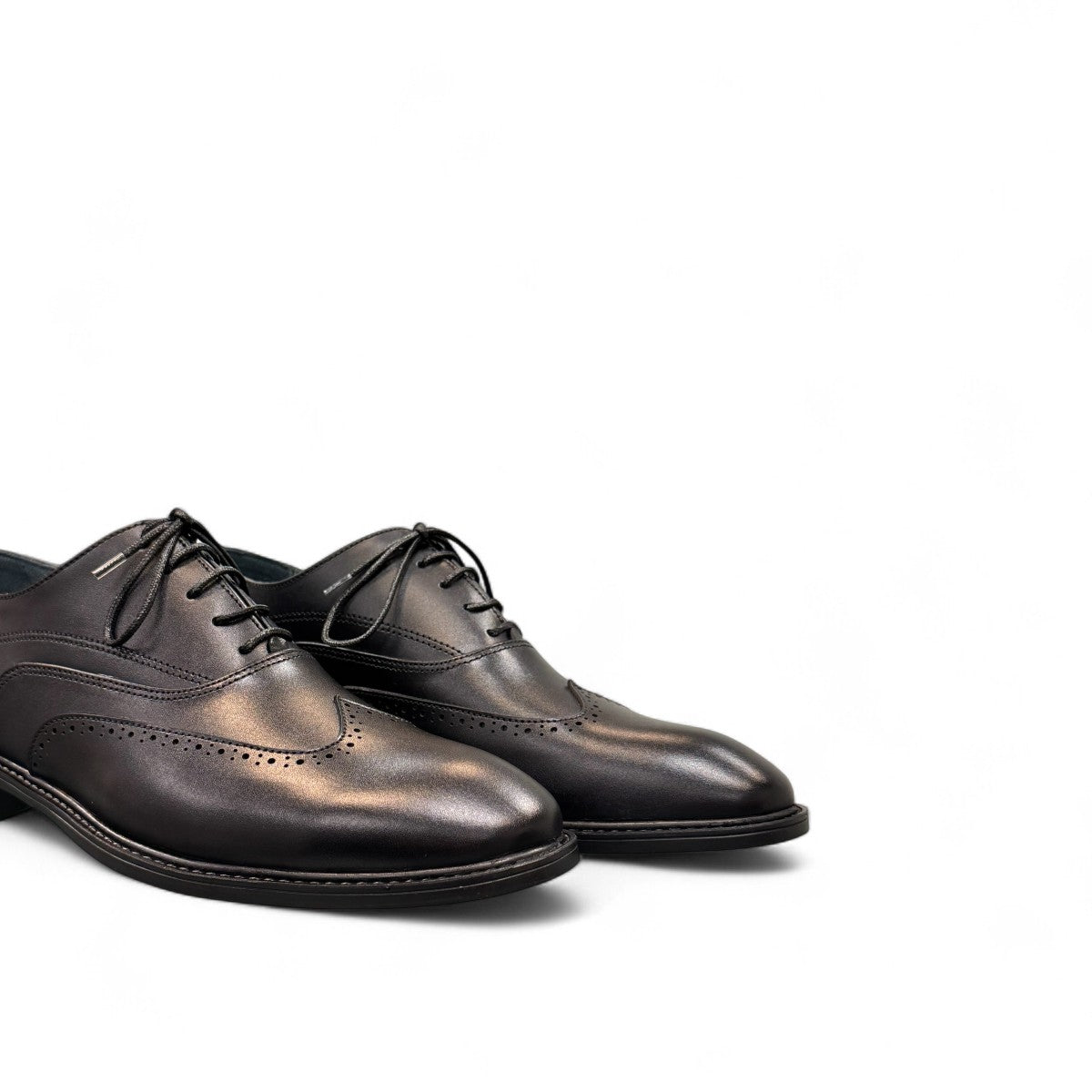 BORNA DRESSY black leather oxford shoes with brogue detailing and a durable rubber outsole. Photo of front views 2.