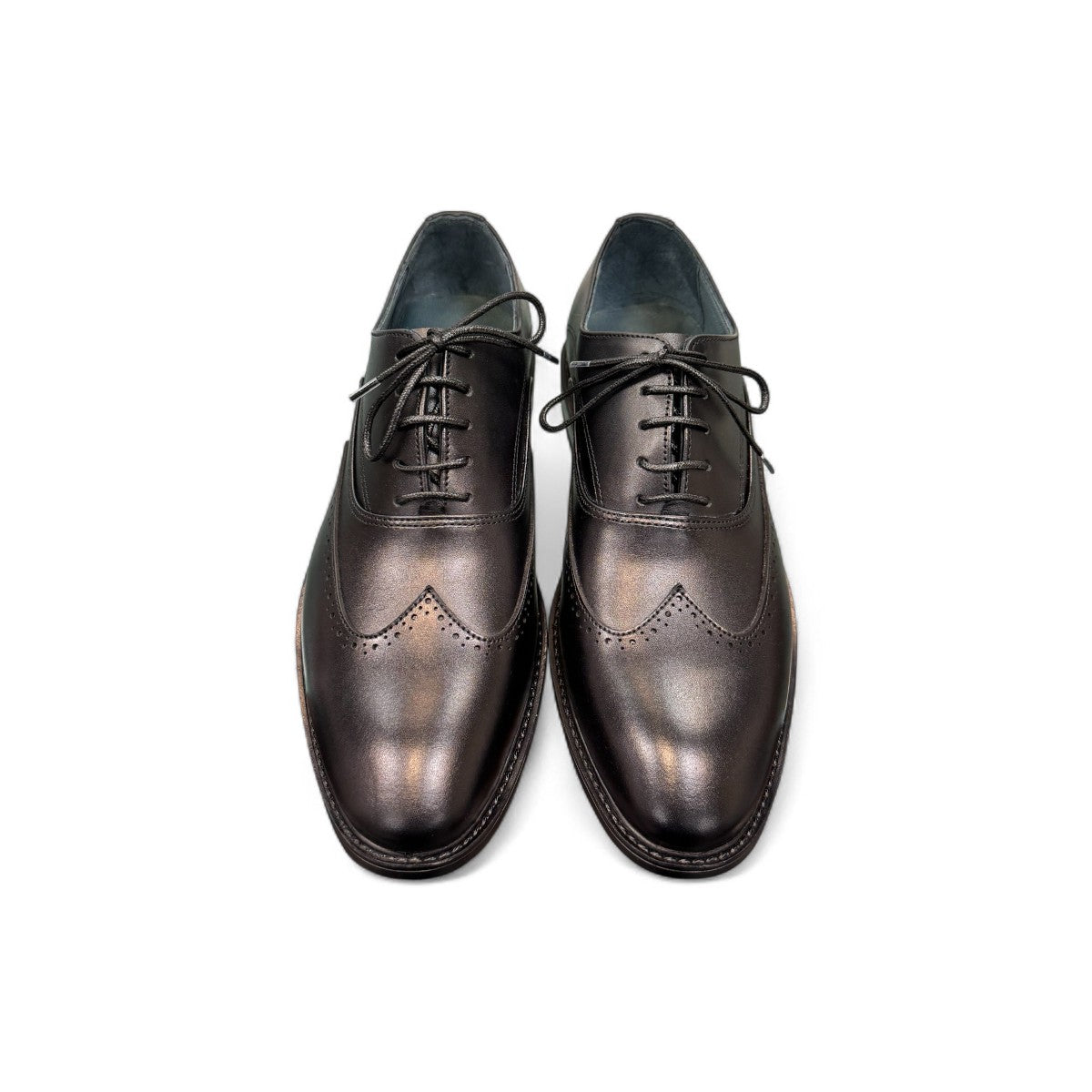 BORNA DRESSY black leather oxford shoes with brogue detailing and a durable rubber outsole. Photo of upper view.