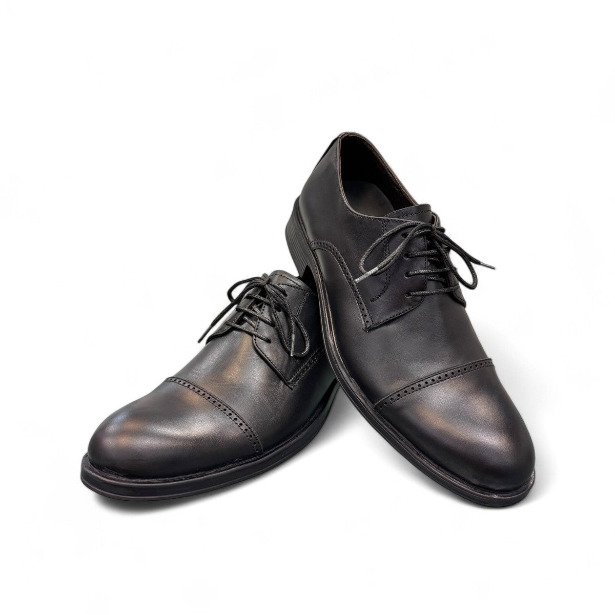 BORNA FASHAM black leather men's dress shoe with lace-up closure and durable rubber outsole. Photo of front side view.
