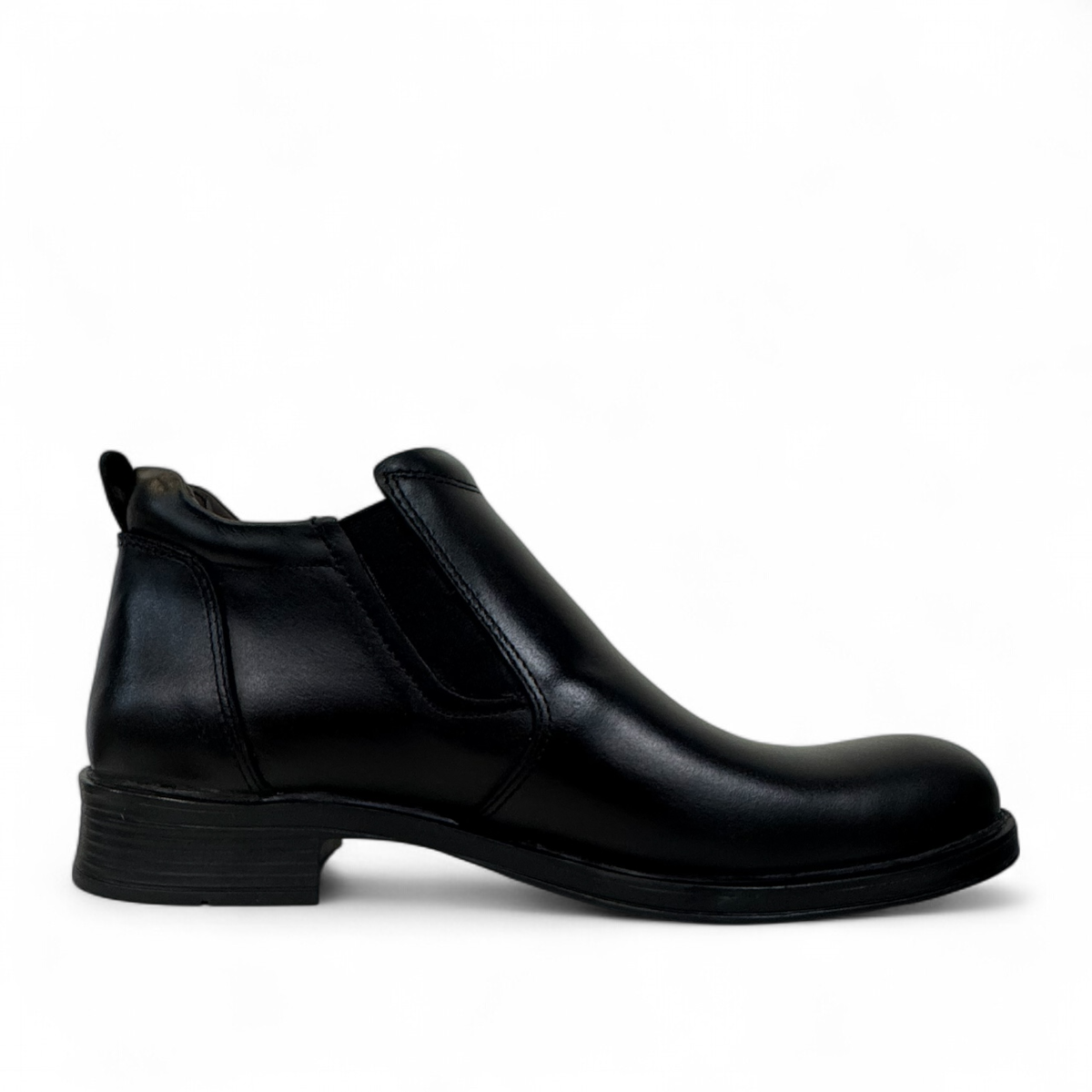 Borna Golestan black leather slip-on men's boots with a durable rubber outsole and side elastic panels. Photo of left side view.