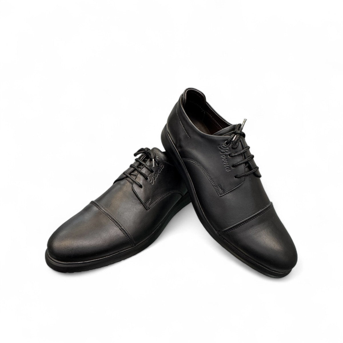 Borna Kan black leather men's dress shoe with a rubber outsole and lace-up closure. Photo of front side view.