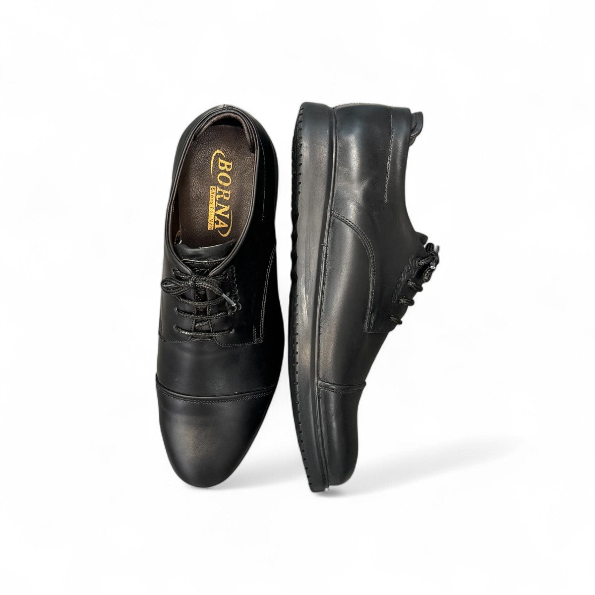 Borna Kan black leather men's dress shoe with a rubber outsole and lace-up closure. Photo of the sole.