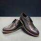 BORNA SADABAD black leather lace-up dress shoe with a durable rubber outsole and side profile view. Photo of front side view 1.