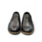 Borna Sadabad black leather slip-on men's shoes with a durable rubber outsole and minimalist design. Photo of front view 1.