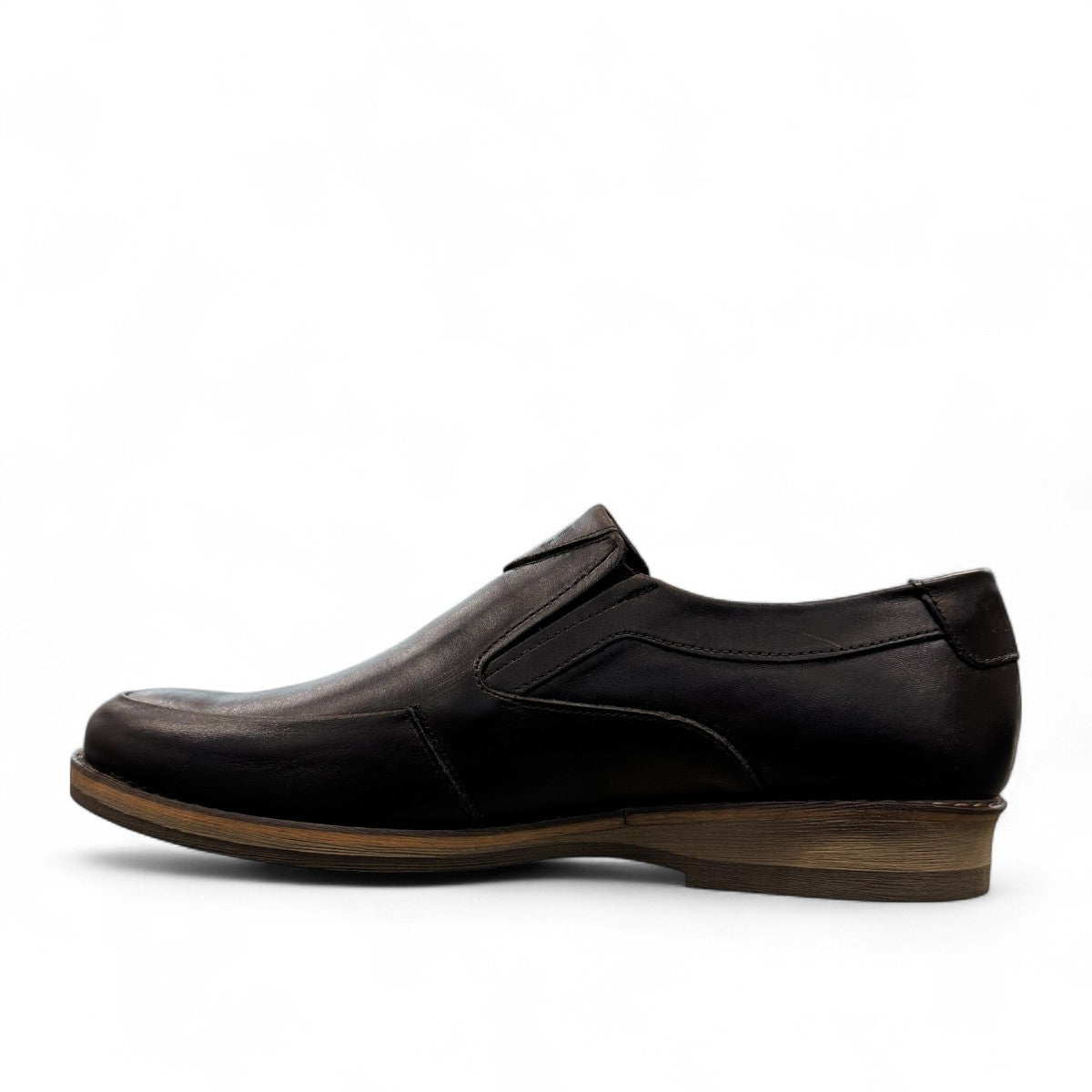 Borna Sadabad black leather slip-on men's shoes with a durable rubber outsole and minimalist design. Photo of left side view.
