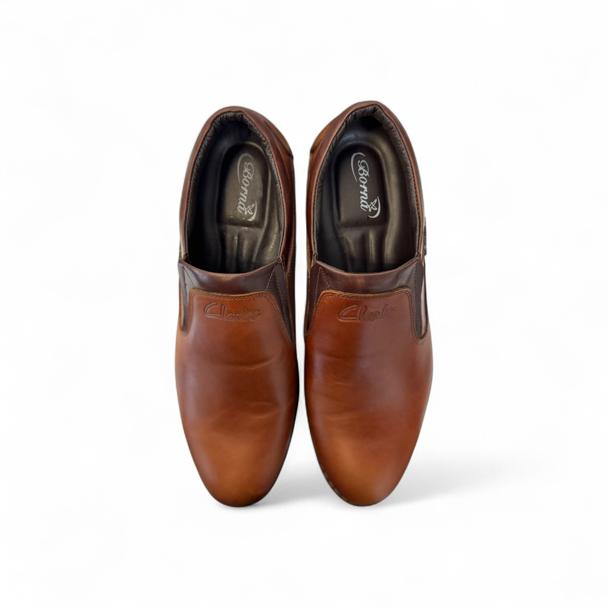 Borna Shams brown leather slip-on men's shoes with a rubber outsole and side branding detail. Photo of upper view.