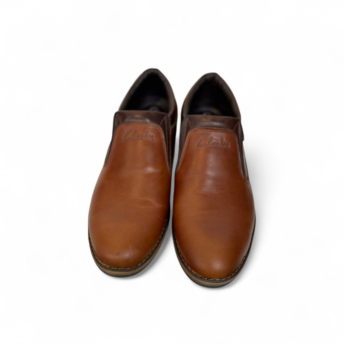 Borna Shams brown leather slip-on men's shoes with a rubber outsole and side branding detail. Photo of front view 1.