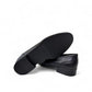 Borna Tajrish black leather loafers for men with a rubber outsole and metal detail. Photo of bottom view.