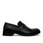 Borna Tajrish black leather loafers for men with a rubber outsole and metal detail. Photo of right side view.