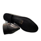 Bottero  black leather loafers with a metal horsebit detail and a classic slip-on silhouette.