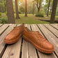 Bottero Garry slip-on shoe in caramel leather with a textured rubber sole and gold eyelet details.
