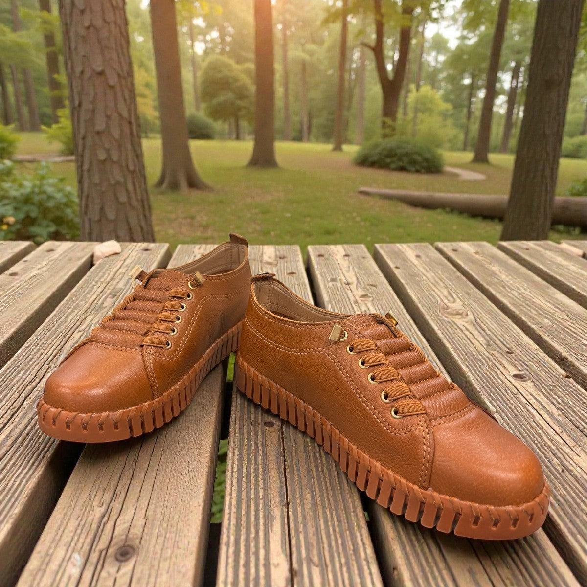 Bottero Garry slip-on shoe in caramel leather with a textured rubber sole and gold eyelet details.