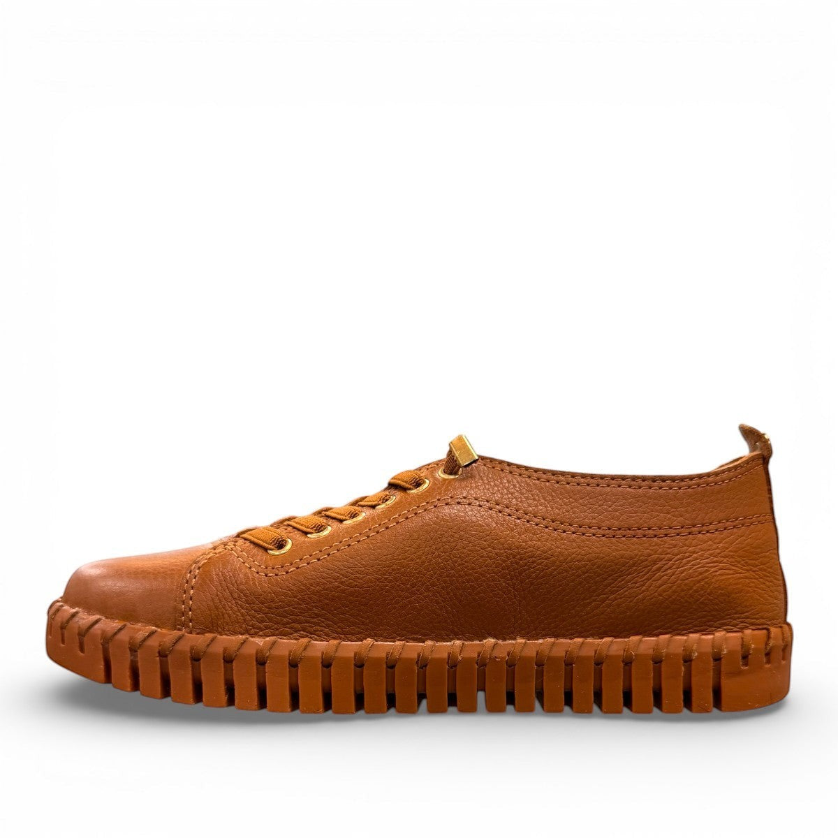 Bottero Garry slip-on shoe in caramel leather with a textured rubber sole and gold eyelet details.