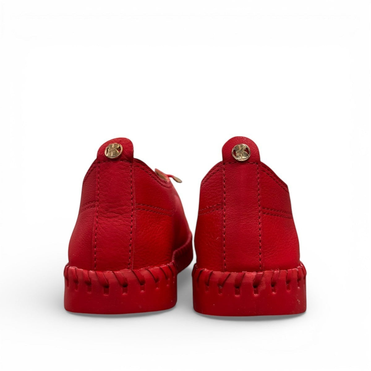 Bottero Garry red leather slip-on sneaker with a flexible ridged sole and low profile design.
