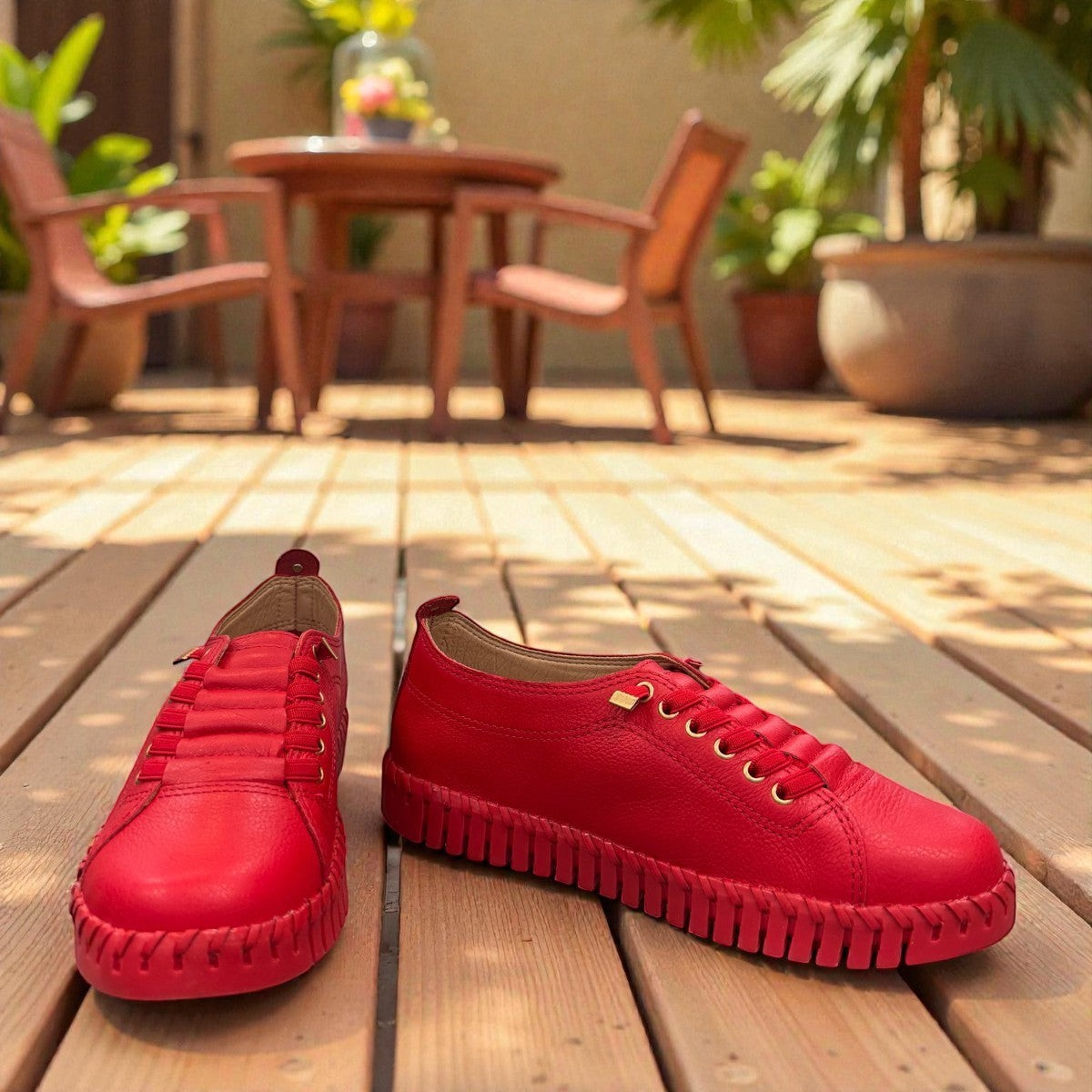 Bottero Garry red leather slip-on sneaker with a flexible ridged sole and low profile design.