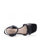 Bottero Nikki black leather sandal with a knotted front strap, adjustable buckle, and low block heel.