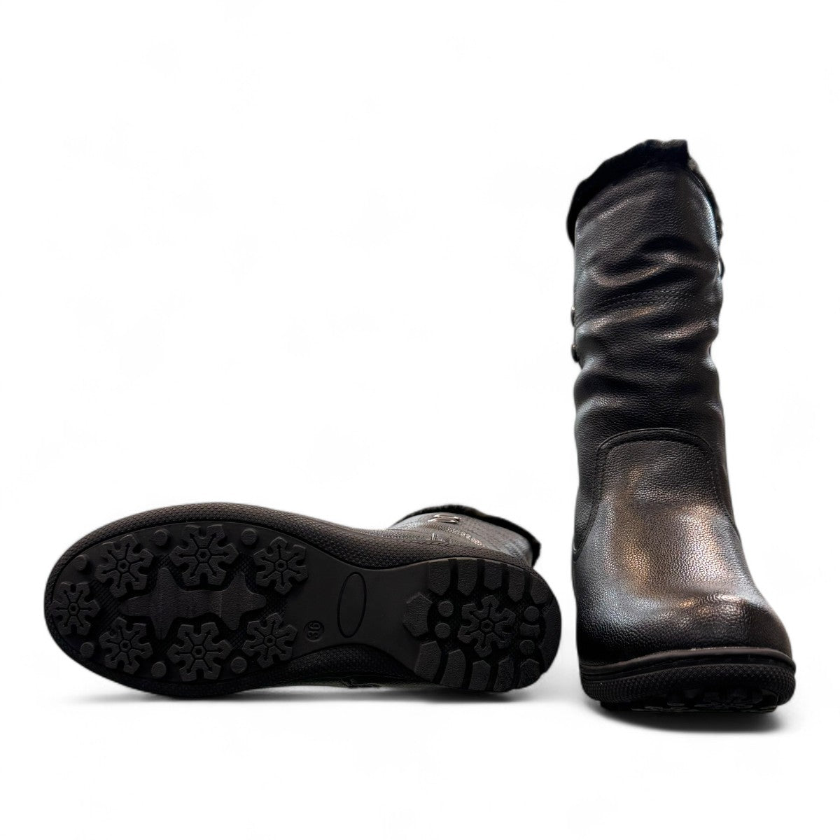Canada Comfort black mid-calf boot with faux fur collar, side zipper, and durable rubber wedge sole. Photo of bottom view.