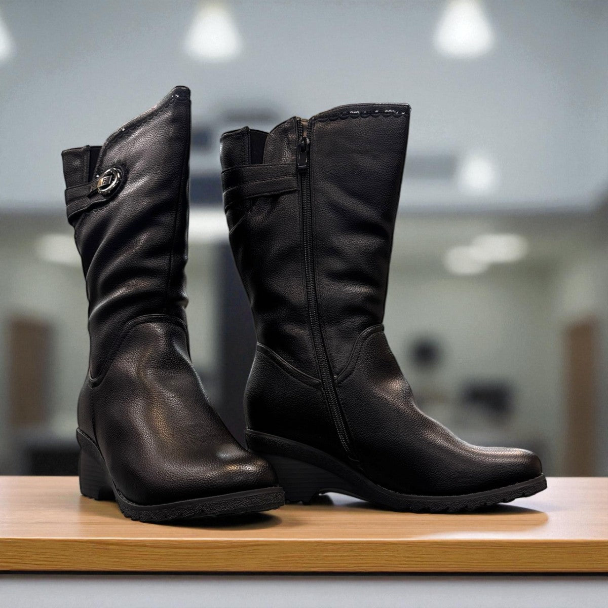 Canada Comfort side zip F209 black leather winter boot with side zipper, fleece lining, and low wedge heel. Photo of side views.
