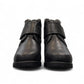 Canada Comfort black waterproof ankle boot with velcro strap and faux fur trim for winter traction. Photo of front view.