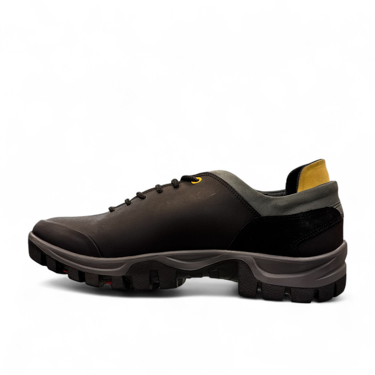 CAT black nubuck leather lace-up sneaker with a durable rubber outsole and handmade stitching detail. left view.