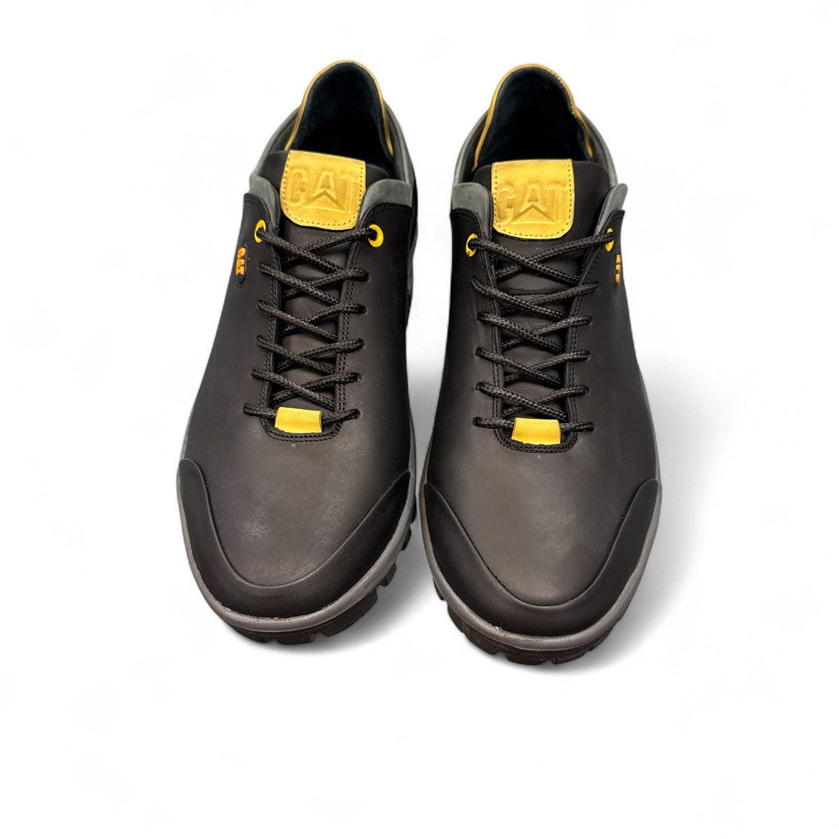 CAT black nubuck leather lace-up sneaker with a durable rubber outsole and handmade stitching detail. top view.