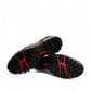 CAT black nubuck leather lace-up sneaker with a durable rubber outsole and handmade stitching detail. bottom view.