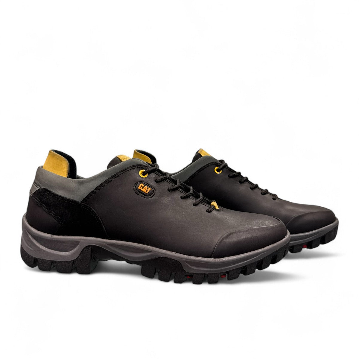 CAT black nubuck leather lace-up sneaker with a durable rubber outsole and handmade stitching detail. right view.