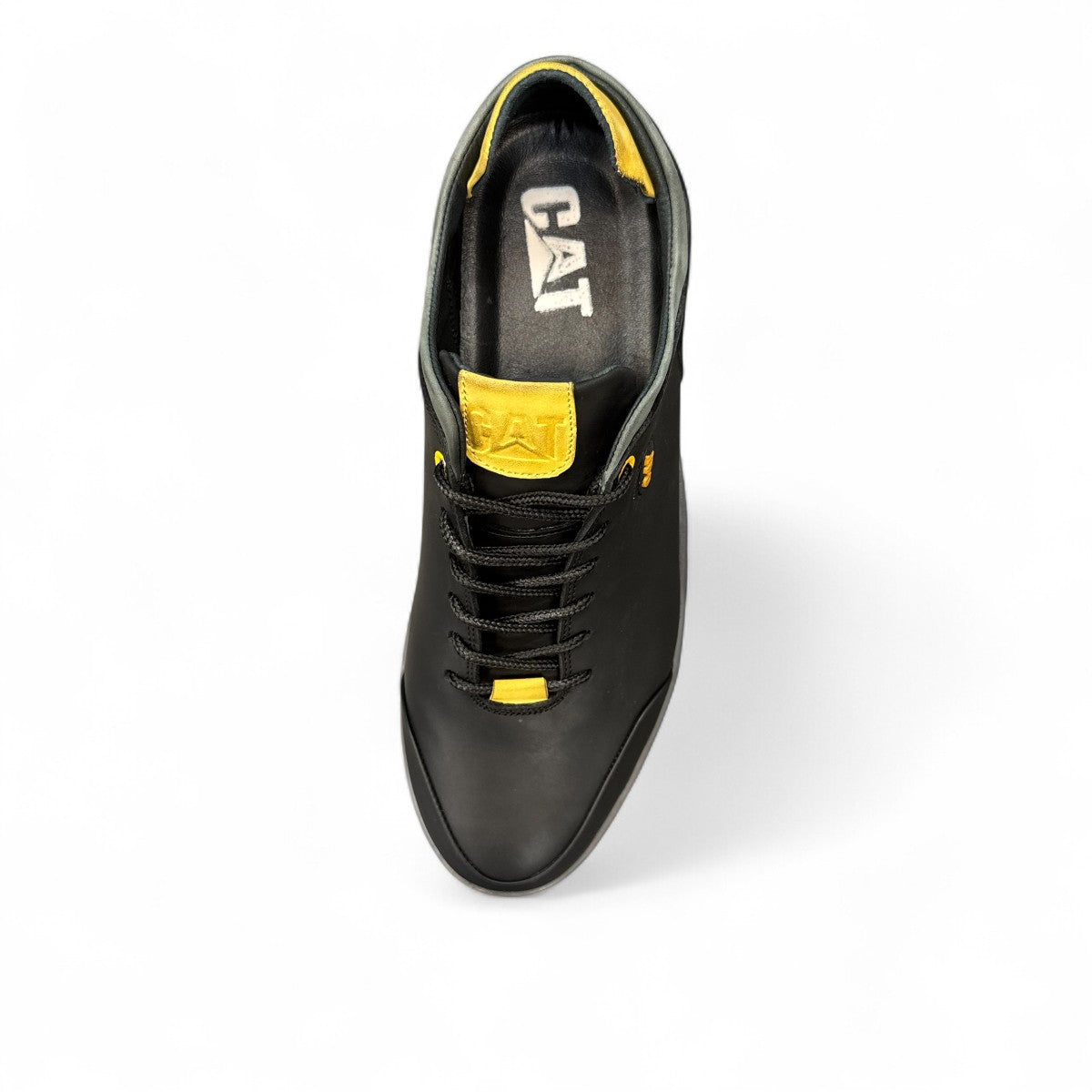 CAT black nubuck leather lace-up sneaker with a durable rubber outsole and handmade stitching detail. top view.