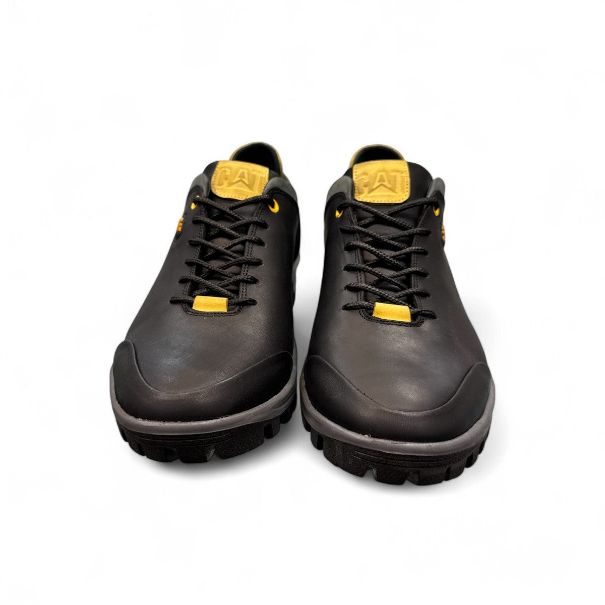CAT black nubuck leather lace-up sneaker with a durable rubber outsole and handmade stitching detail. front view.