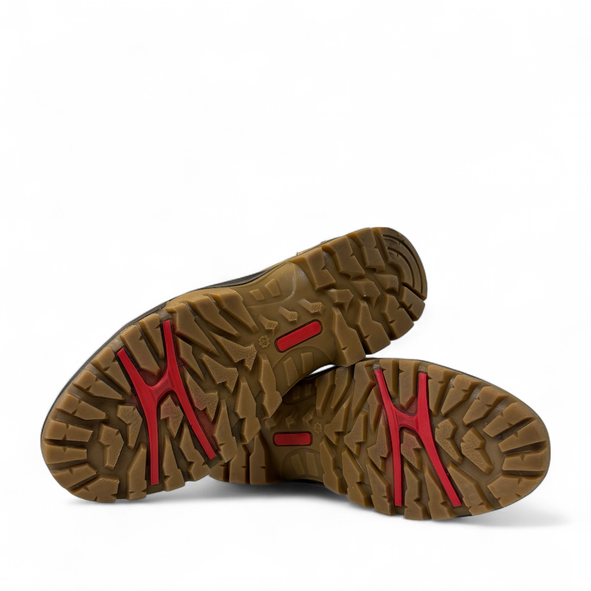 CAT TABAL brown nubuck boots showing the durable rubber outsoles with red traction inserts. bottom view.