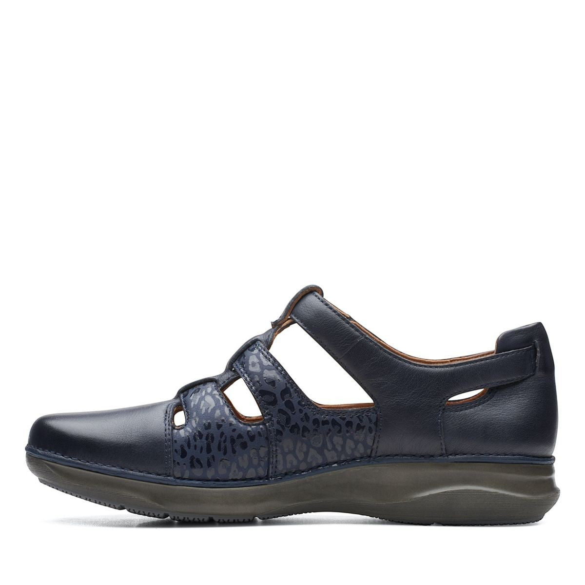 Clarks Appley Strap black leather shoes with leopard print detailing and adjustable hook-loop straps. left view.