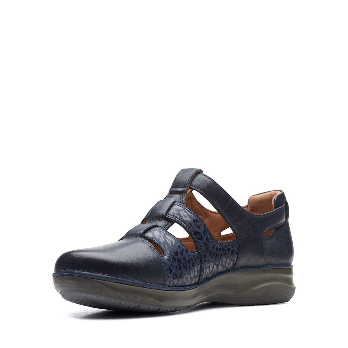 Clarks Appley Strap black leather shoes with leopard print detailing and adjustable hook-loop straps. front view.