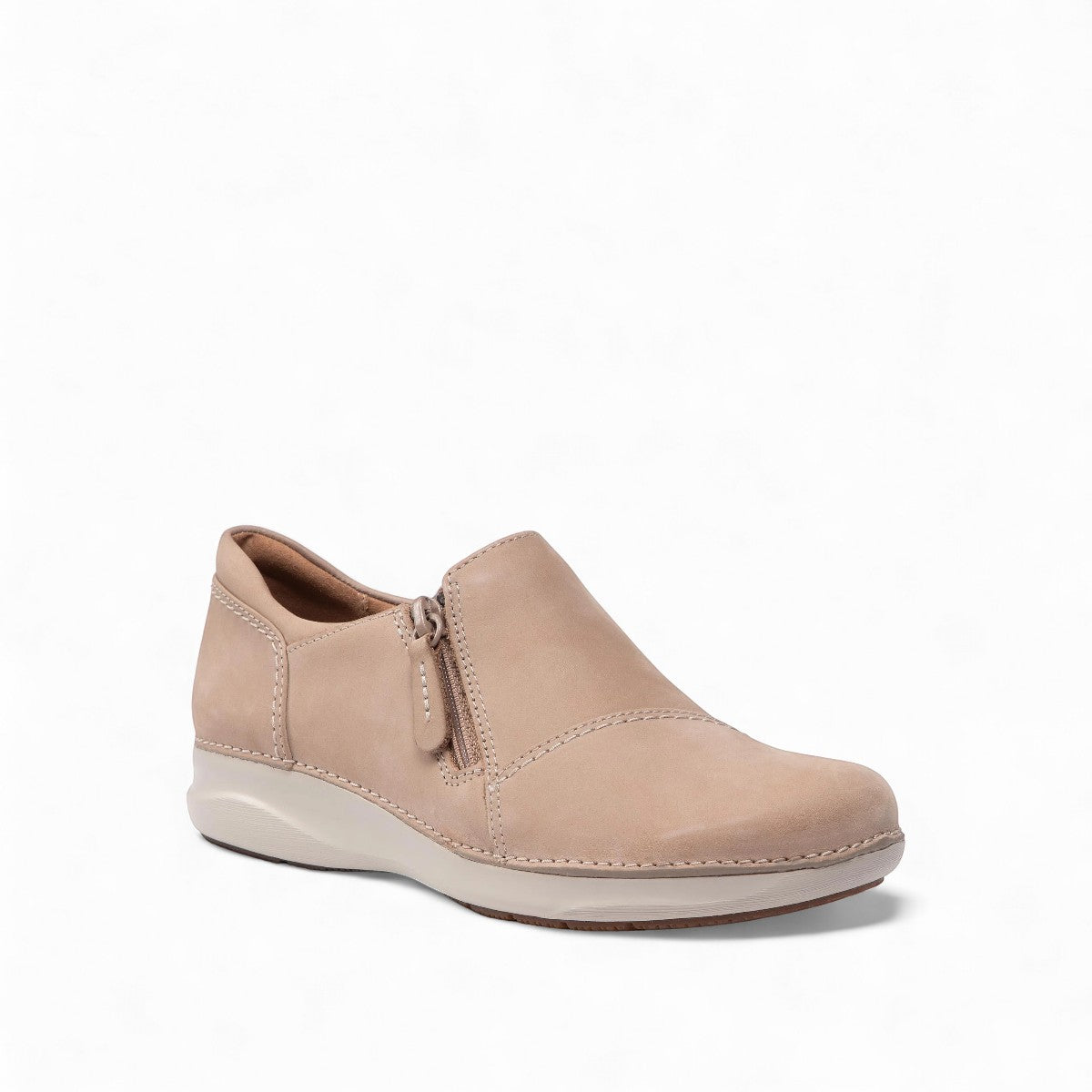Clarks Appley Zip slip-on shoes in sand nubuck leather with side zipper and cushioned sole. front view.