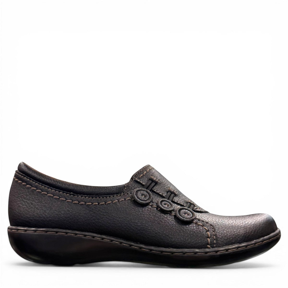 Clarks Ashland Effie black leather slip-on shoe with round toe and decorative button detail. right view.