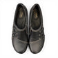 Clarks Ashland Effie black leather slip-on shoe with round toe and decorative button detail. top view.